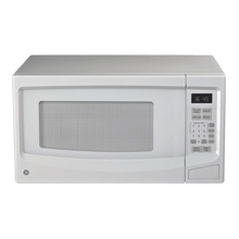 Four à micro-ondes de comptoir 1,1′ GE blanc